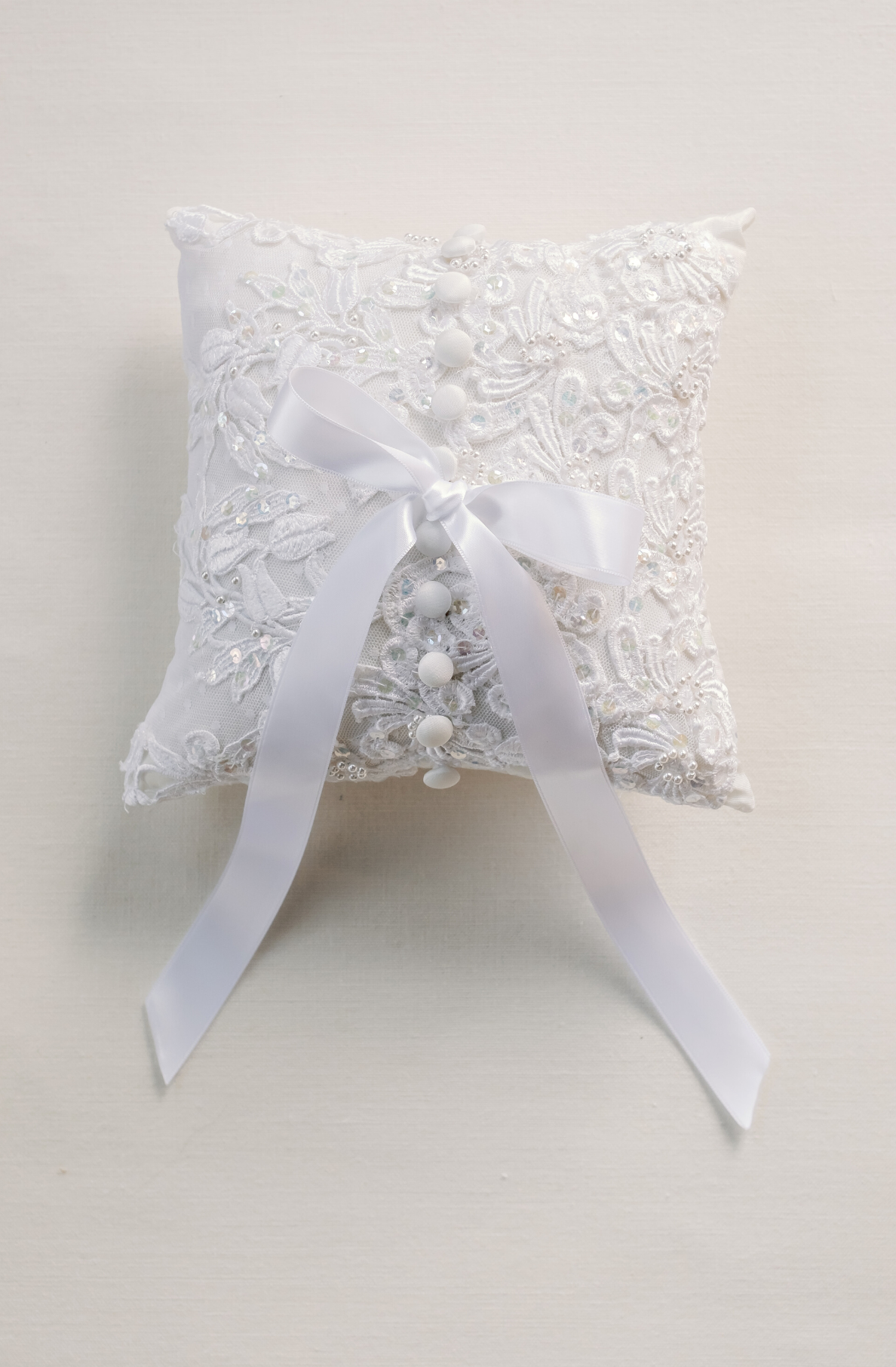 https://www.unboxthedress.com/cdn/shop/files/WebsitePhotos-Shadowbox_Pillow_square_AngelOrnaments_6_1188x.png?v=1699828423